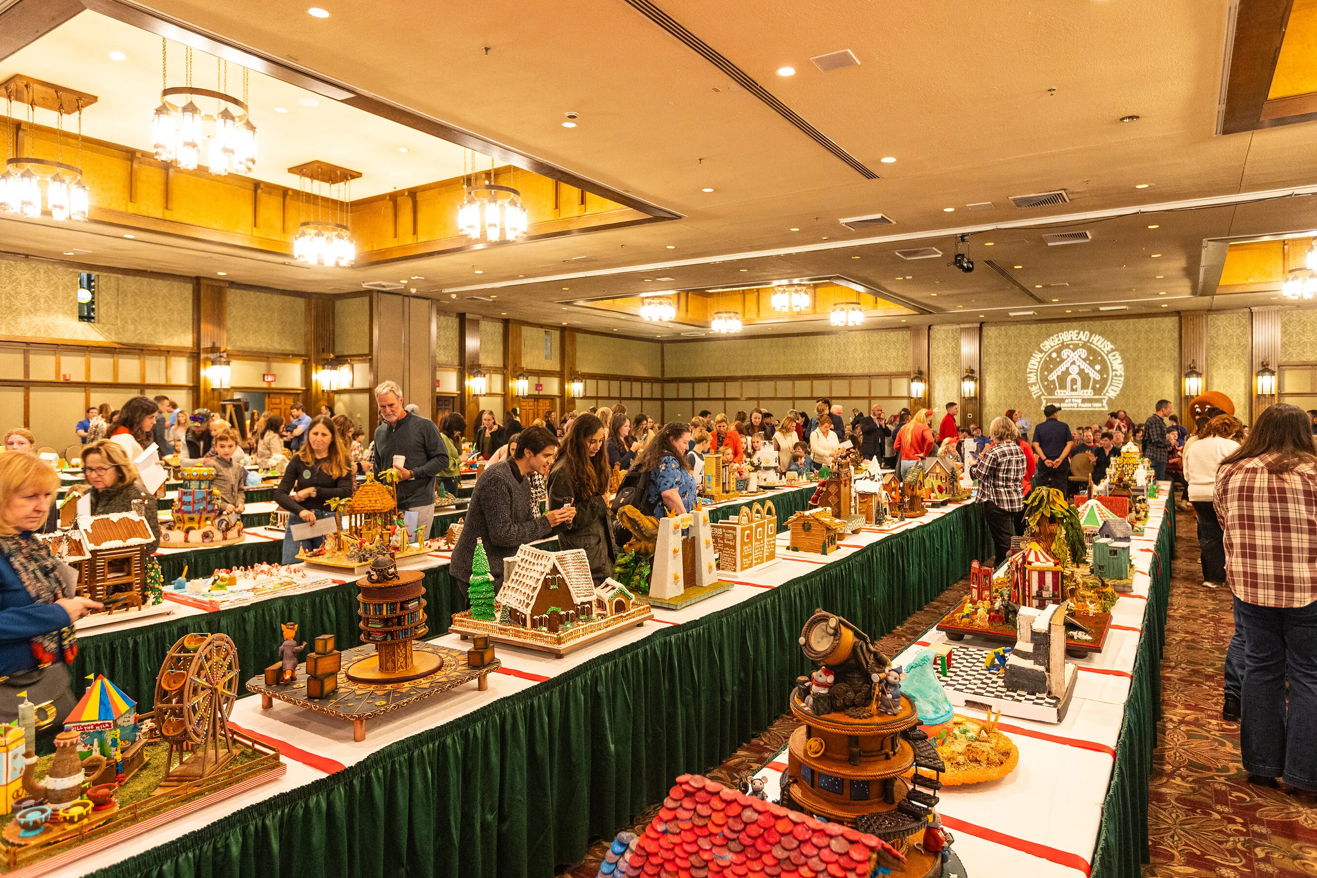 Crowds browse gingerbread house displays at the National Gingerbread House Competition.