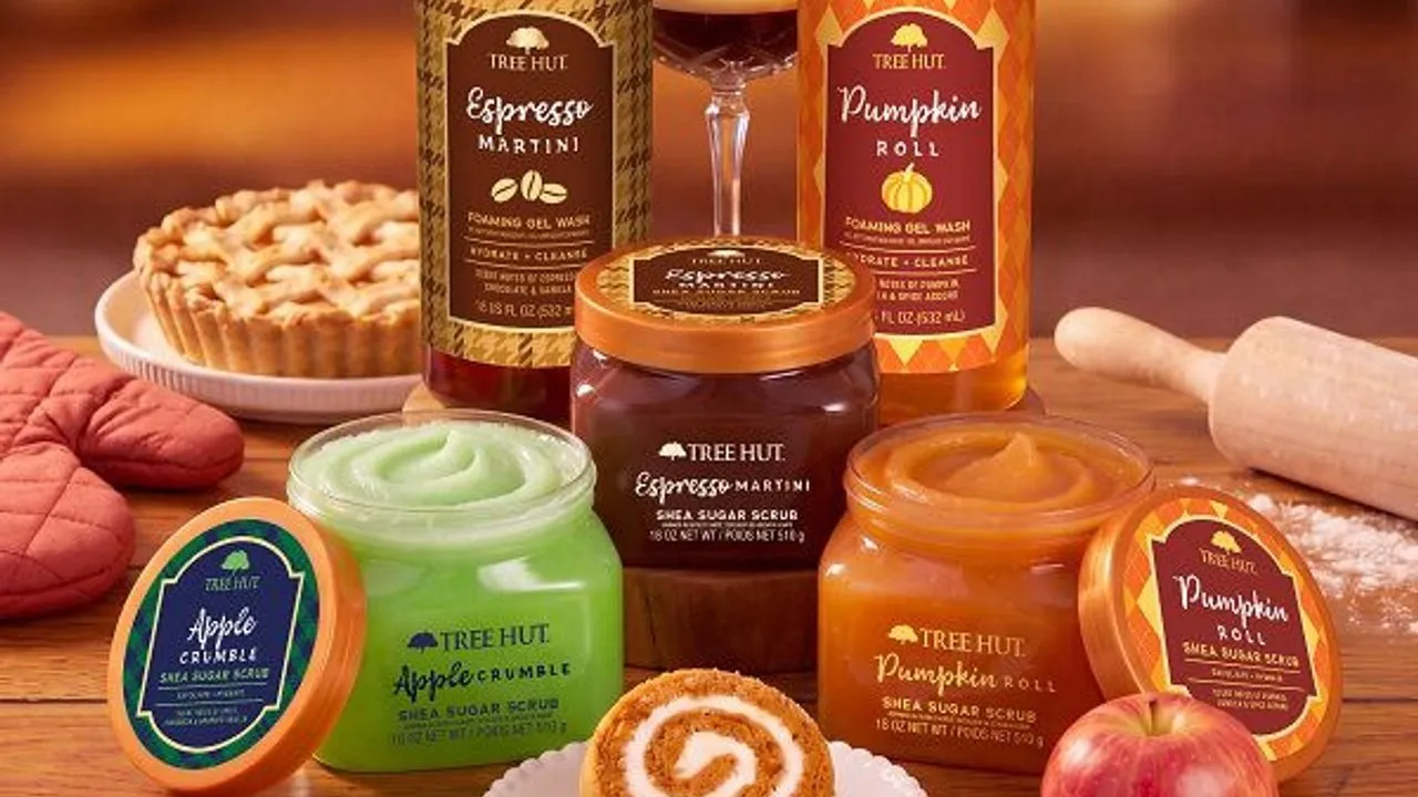 Tree Hut fall body-care products with apple, pumpkin, and espresso scents beside baked treats.